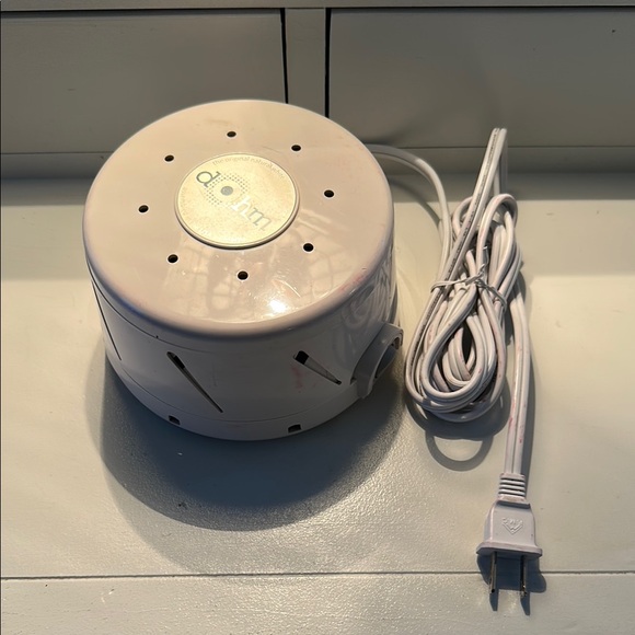 White Circular Audio Device with Perforated Design - Picture 1 of 2